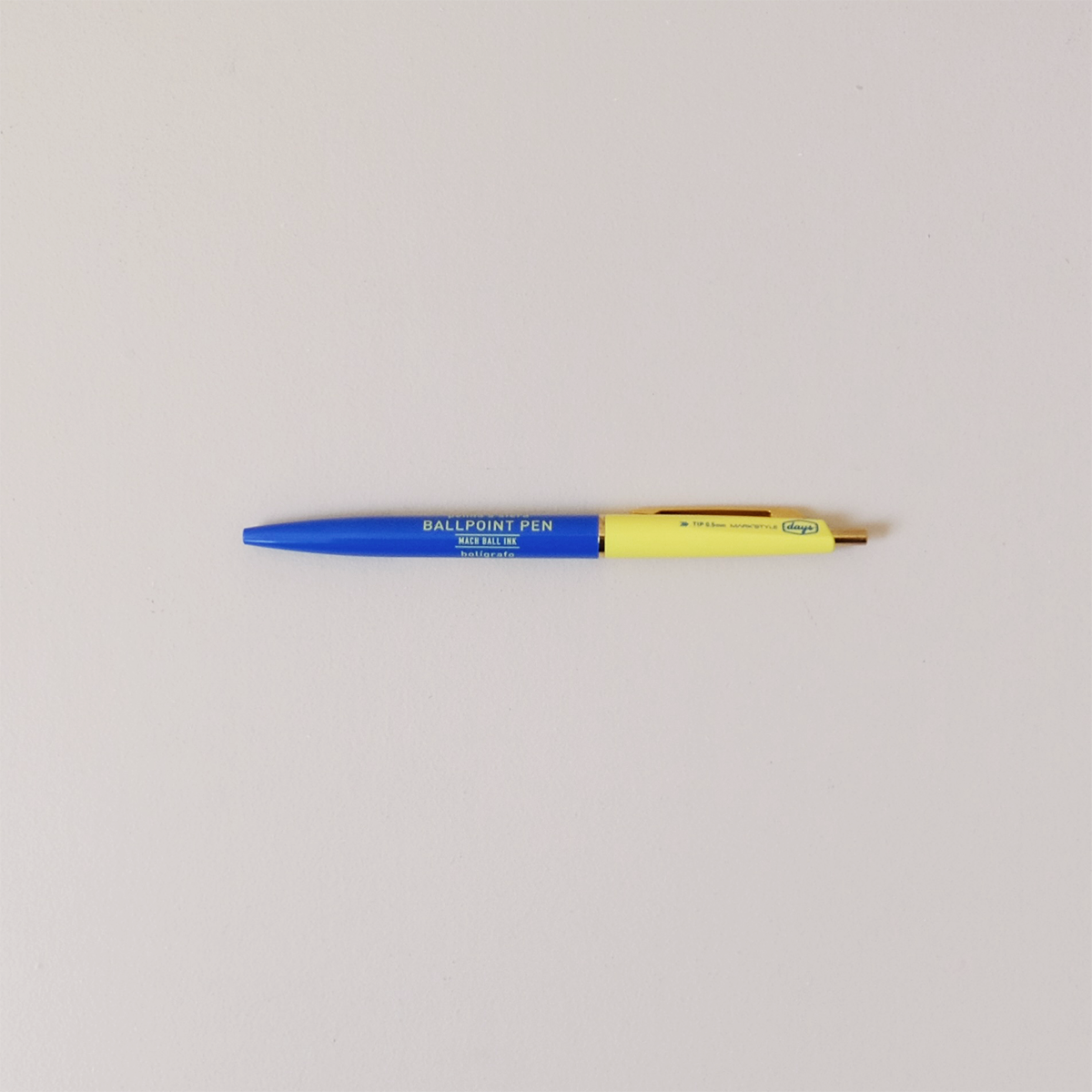 https://shopholliday.com/cdn/shop/files/Mark_s_Day-Mach-Ballpoint-Pen-Blue-Yellow_1200x1200.png?v=1689953105